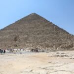 A dog was spotted hanging on top of an ancient pyramid in Egypt