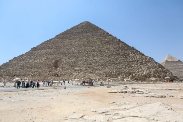 A dog was spotted hanging on top of an ancient pyramid in Egypt