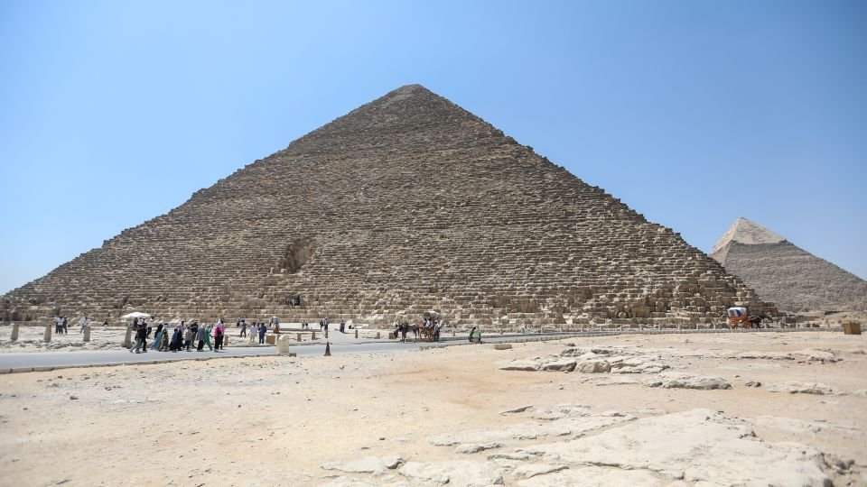 A dog was spotted hanging on top of an ancient pyramid in Egypt