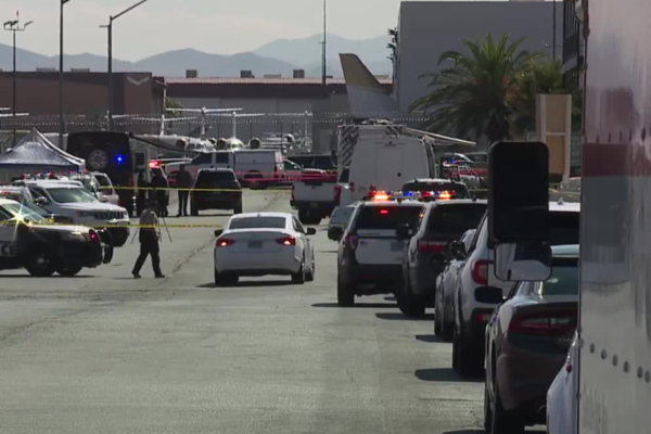 A man with a knife was shot dead by police outside a business near Tropicana, Couval