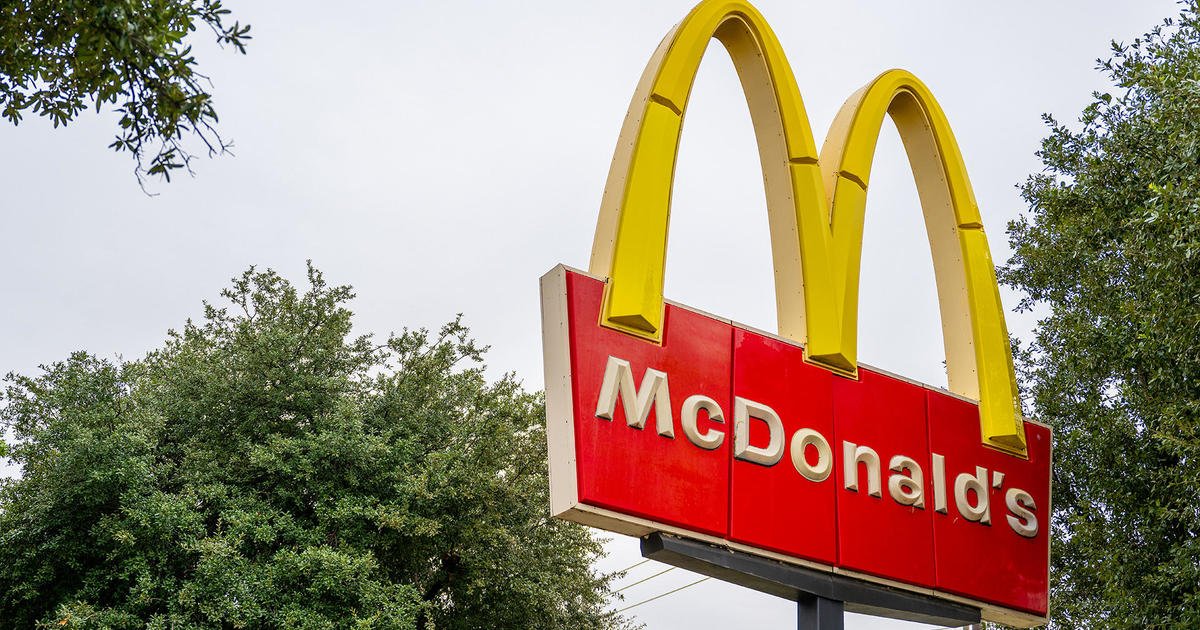 McDonald's is investing $100 million to lure customers back to the fast food giant after an E. coli outbreak