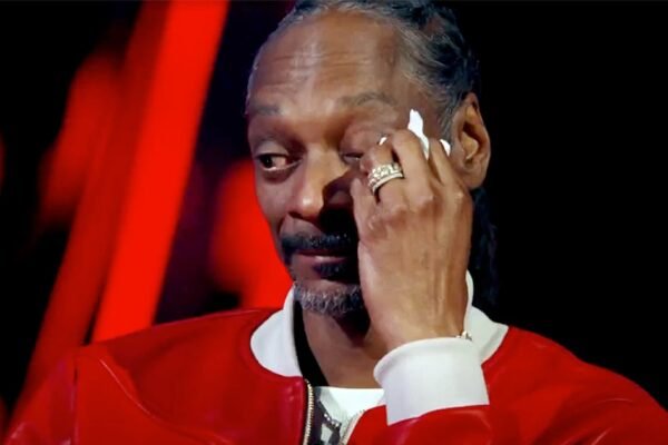 Snoop Dogg cries as a contestant's performance on The Voice reminds him of his late mother