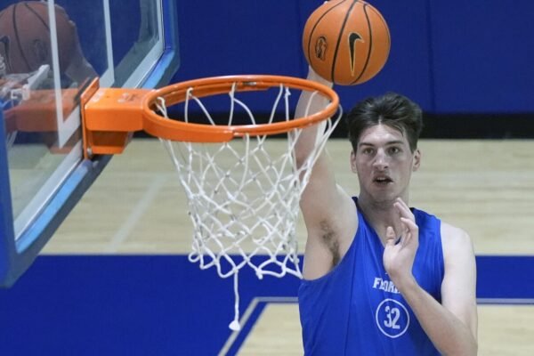 The world's tallest teenager, Olivier Rioux, plans to redshirt in Florida