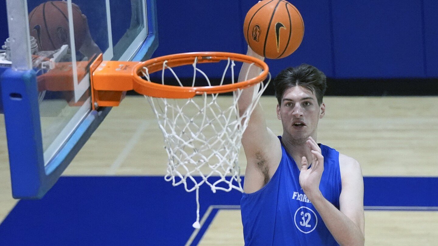 The world's tallest teenager, Olivier Rioux, plans to redshirt in Florida